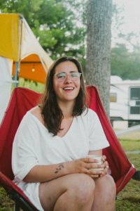 Abigail Cassio at sitting in camping chair